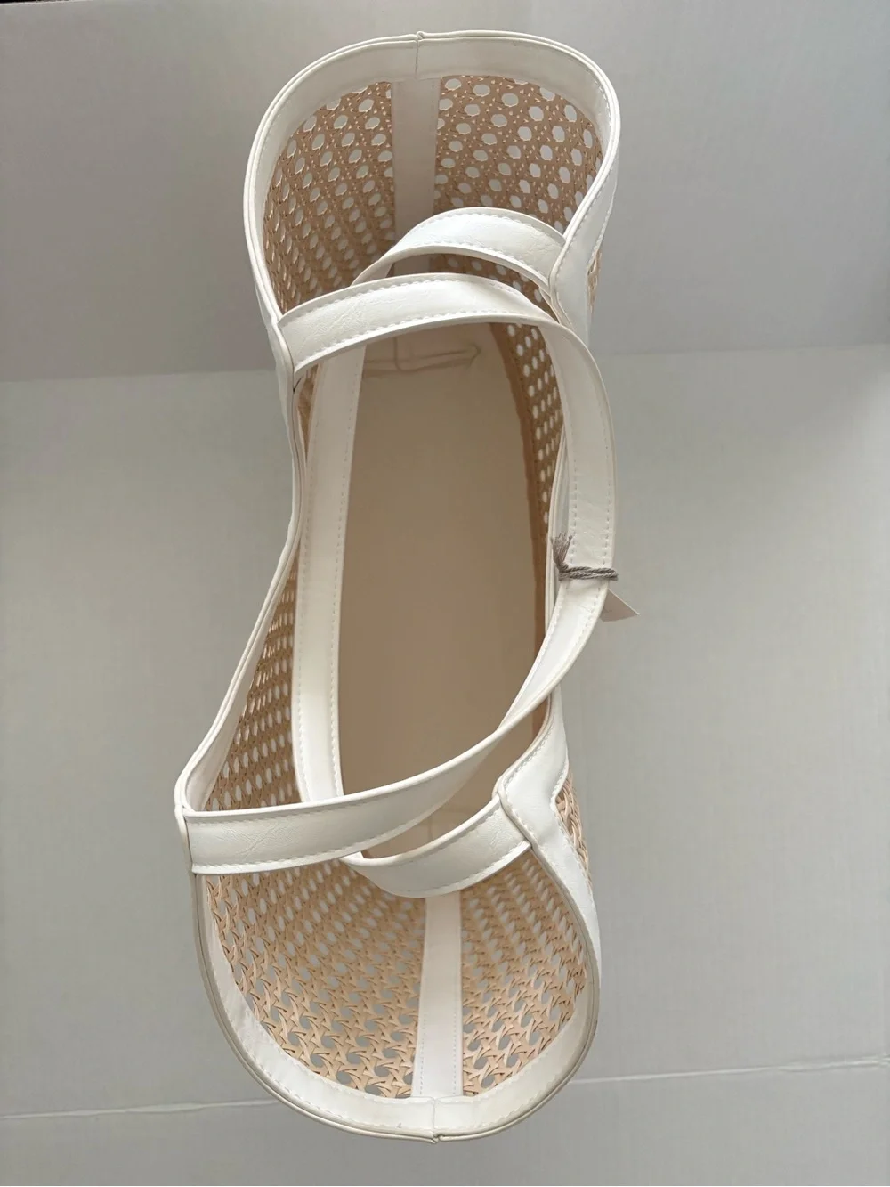 A New Day Straw Caning Tote Bag natural woven cane design white trim detailing.
